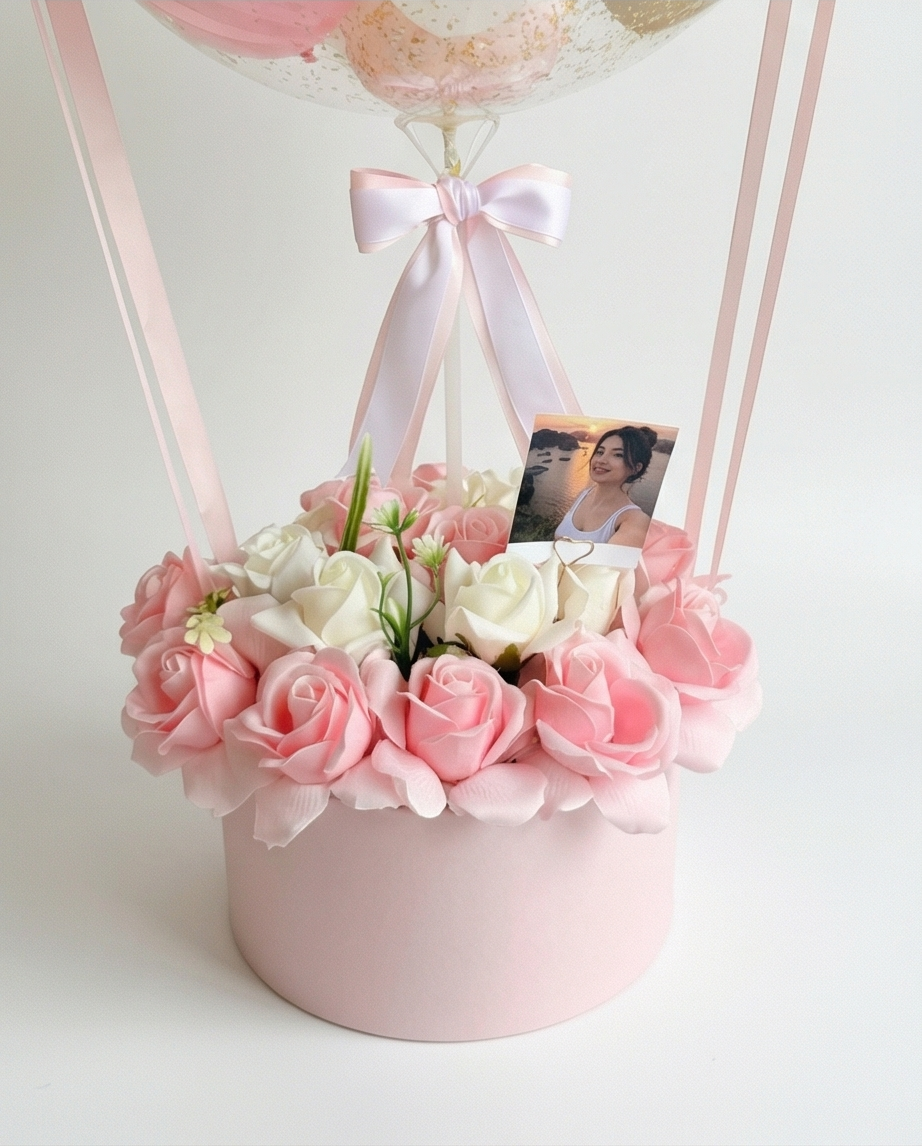 Decorative birthday balloon with flowers and balloons inside, flowers close up