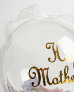 Clear dome with gold 'Happy Mother's Day' text and a white bow