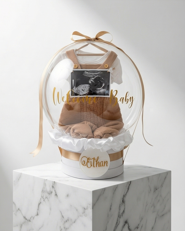 Baby shower gift with baby onesie, socks, and ultrasound photo inside a decorative box, full product view