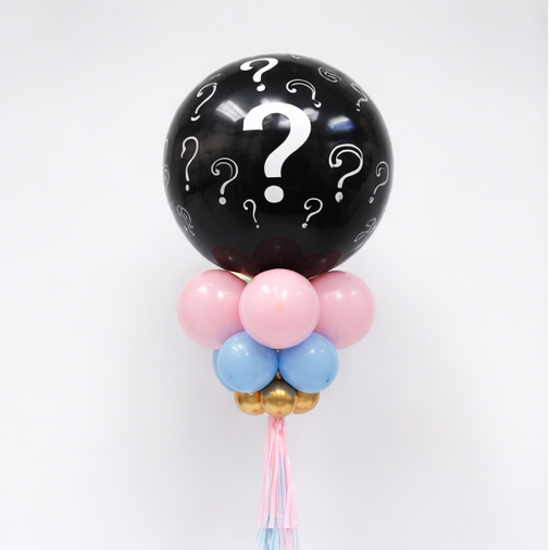 Black balloon with question marks and colorful base, close up balloon