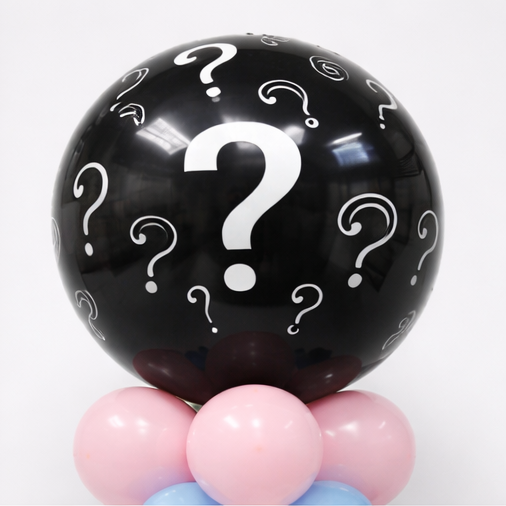 Black balloon with question marks and colorful base, super close up on black balloon